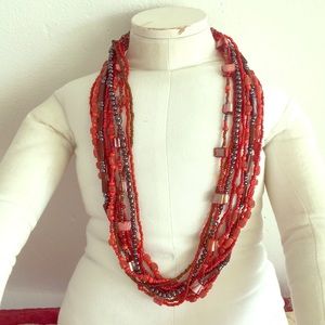 10 Strand Beaded Red Necklace Unusual Clasp 20”